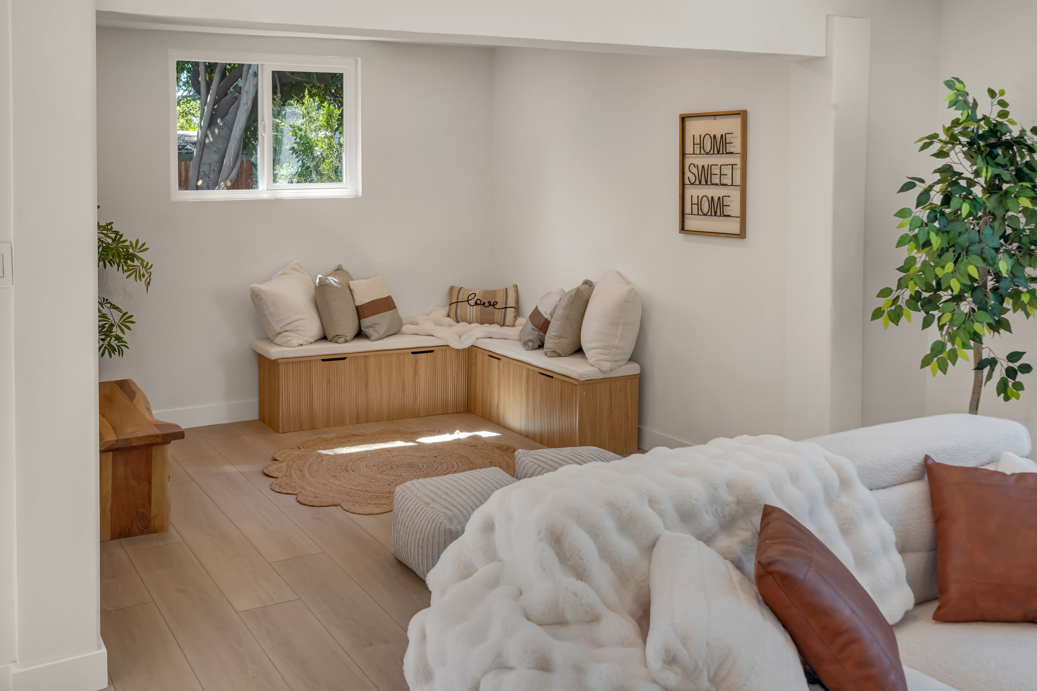 Bonus room wide angle — bench and sofa